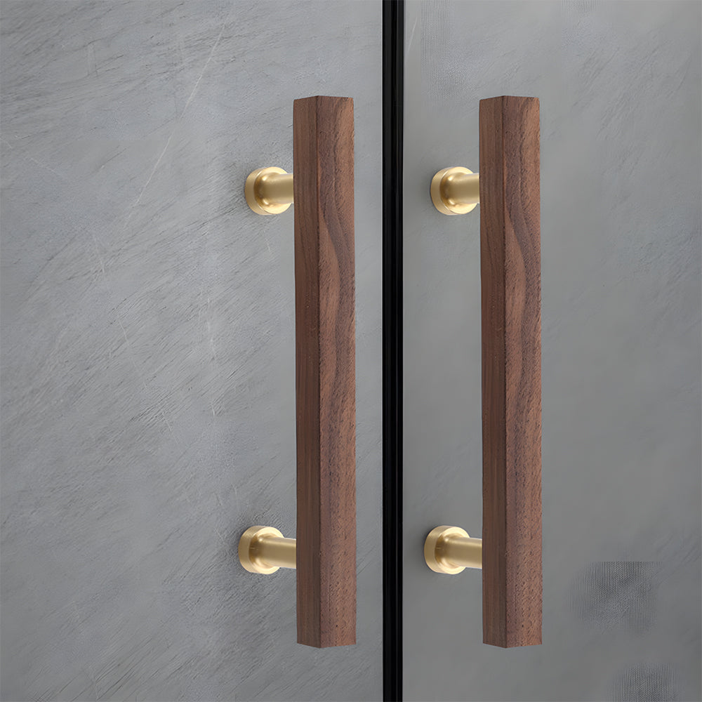 Square wood cabinet pull in brown with 128 mm centers, shown on cabinet fronts in a bright room setting
