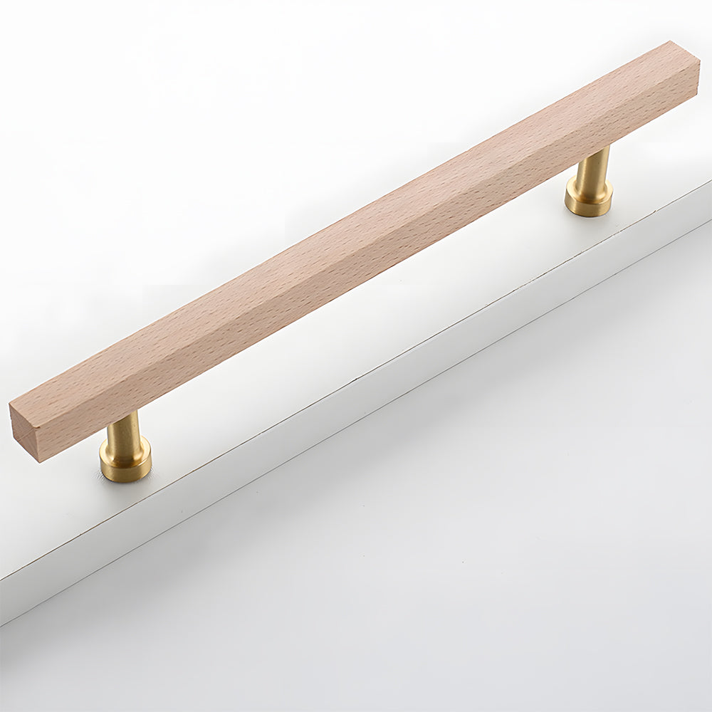 Square wood cabinet pull with round brass bases, shown in a close angled view with its profile visible