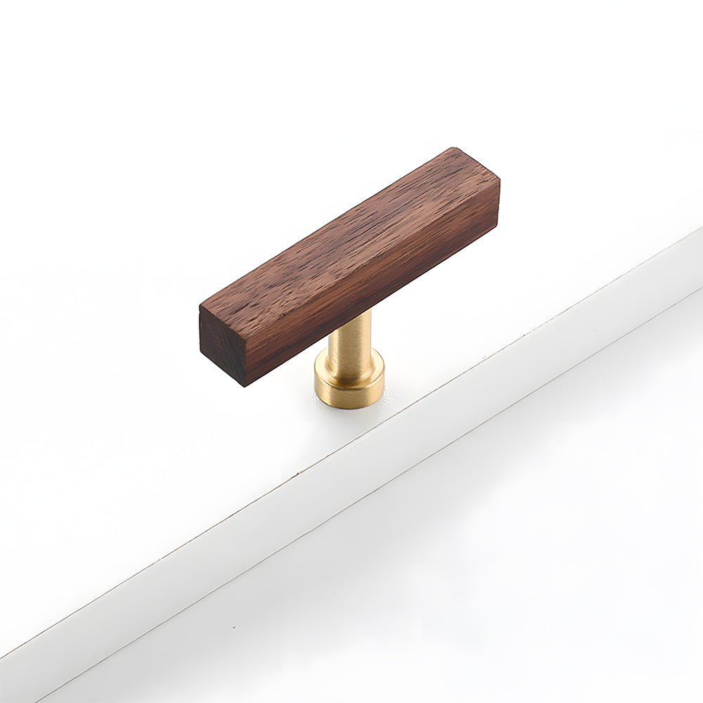 Square wood cabinet pull with round brass bases, shown vertically against a plain white surface