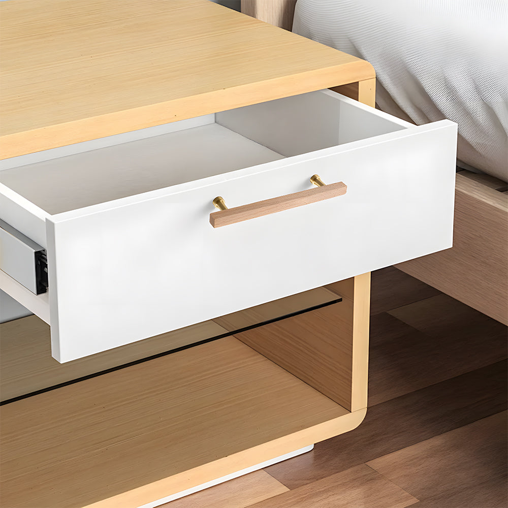 Square wood cabinet pull with round brass bases, mounted on an open drawer with the full profile visible