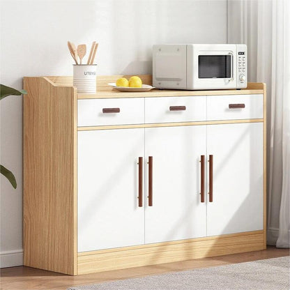 Wood and brass cabinet pull with a round bar profile, installed on kitchen cabinet doors and drawers