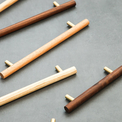 Wood cabinet pull with brass posts in brown with 224 mm centers, arranged with other sizes and finishes for comparison