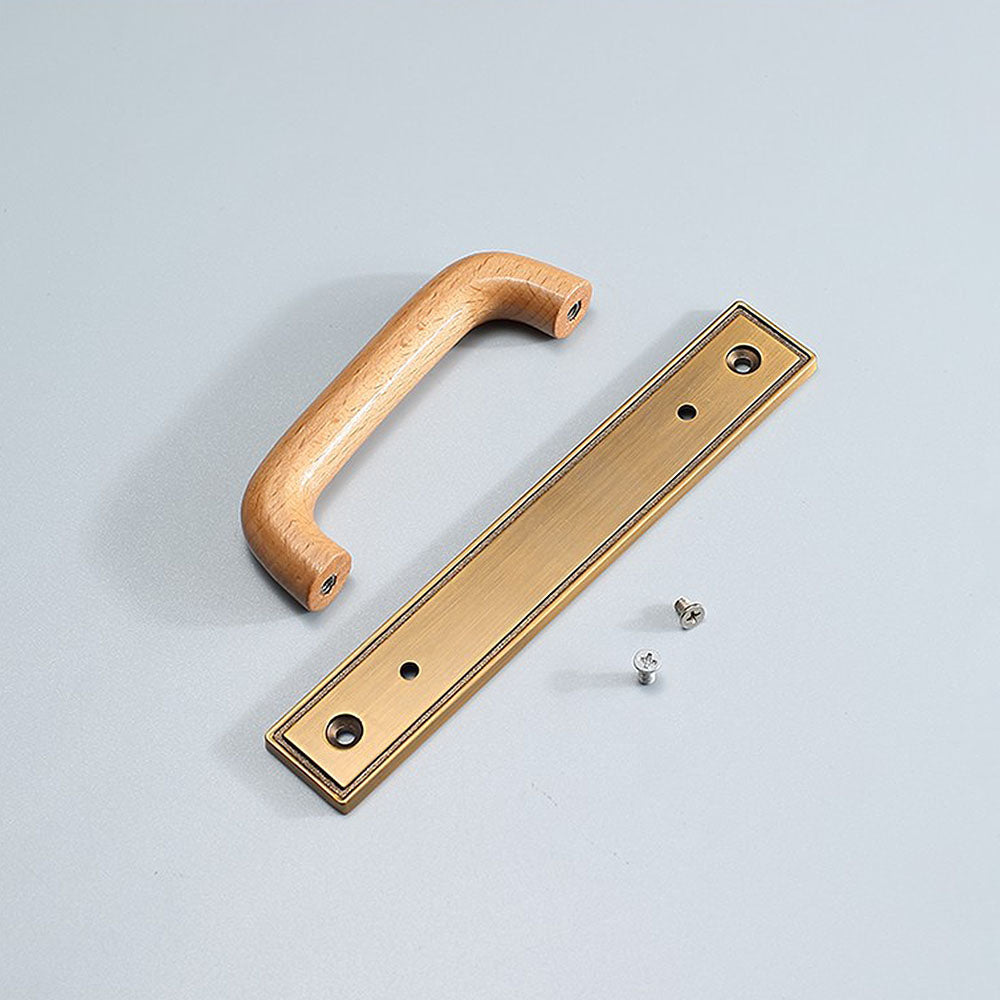 Wood cabinet pull with a rectangular metal backplate, shown from one angle with its construction and finish visible