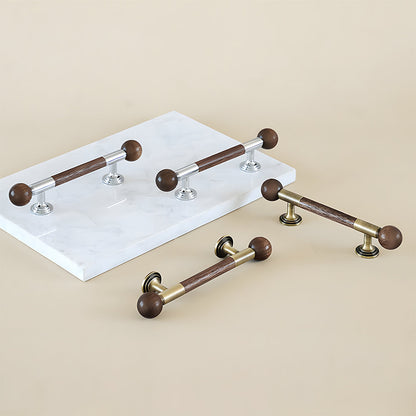 Round wood bar cabinet pull with brass mounts, grouped in long and short versions on a neutral surface