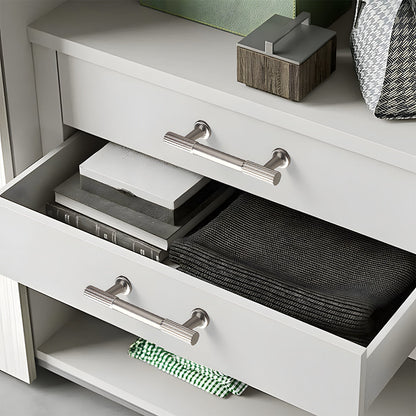 Silver fluted bar cabinet pull and round knob, displayed from the side installed on cabinetry in context