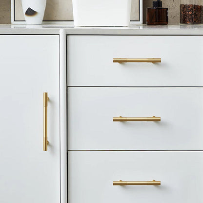 Fluted bar cabinet pull and round knob, shown clearly installed on cabinetry in context