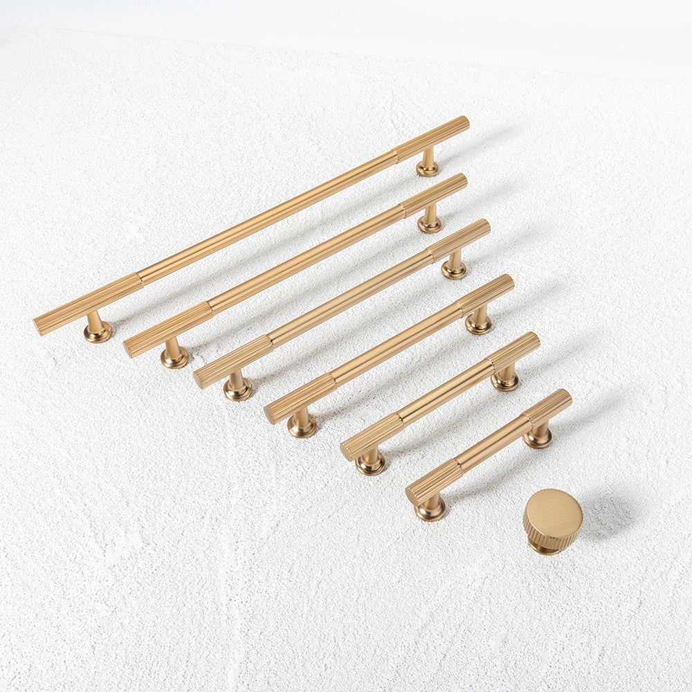 Fluted bar cabinet pull and round knob, displayed from the side as a color and finish lineup