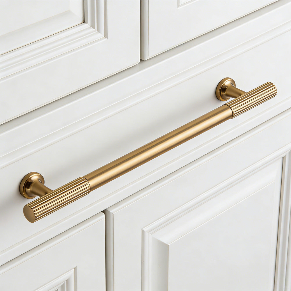 Fluted bar cabinet pull and round knob, shown clearly with the finish and grip area visible