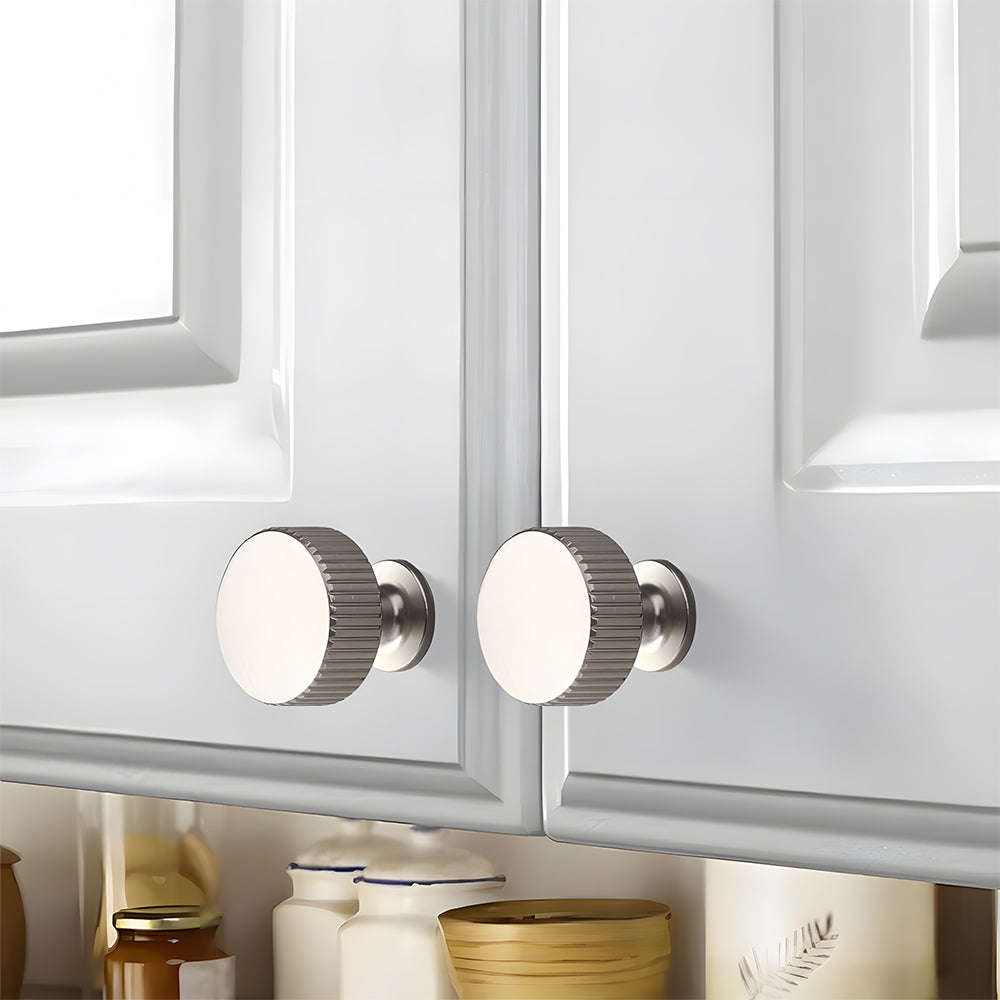 Silver fluted bar cabinet pull and round knob, presented for reference with the finish and grip area visible