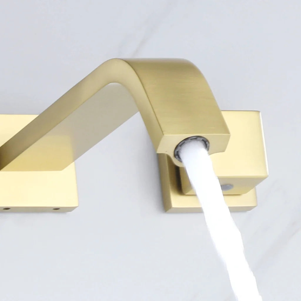 Directs water into the basin