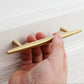 Tapered Solid Brass Cabinet Pulls and Knobs in Gold