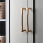 Gold Arched Cabinet Handles and Round Knobs