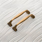 Wide Arched Brass Cabinet Pulls and Drawer Handles